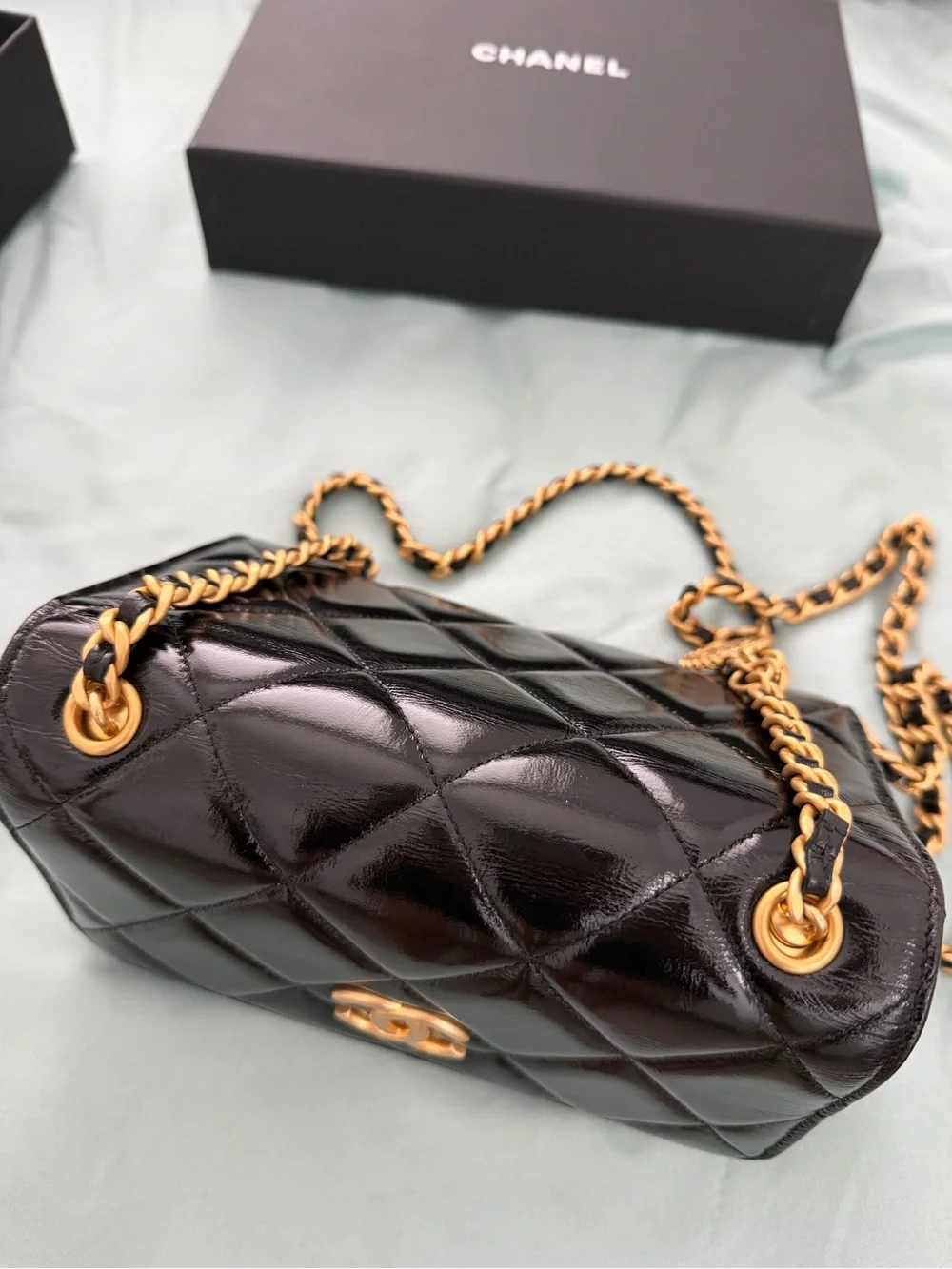 CHANEL Black Quilted Patent Leather Mini Flap with Gold Hardware